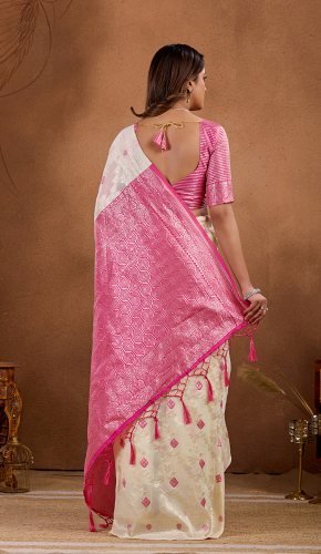 Off-white Banarasi saree with pink zari border and woven motifs
